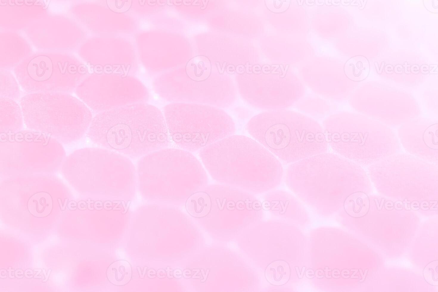 Light Rose Foam Plastic Texture. Abstract Styrofoam Background. Macro Closeup. photo
