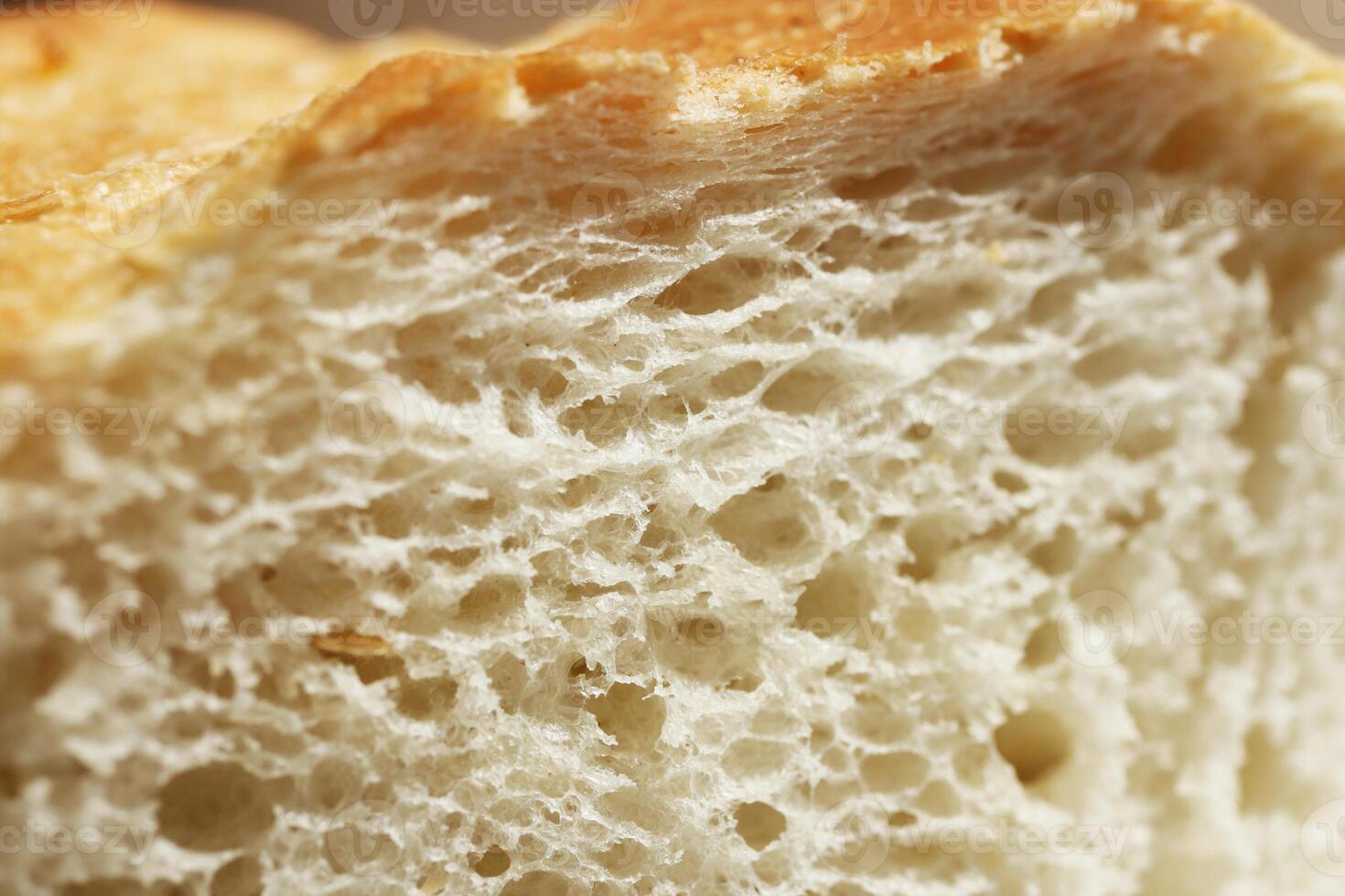 Fresh French Roll Baguette Texture. Bread Crumb Section Slice Food Background. Macro Closeup. photo