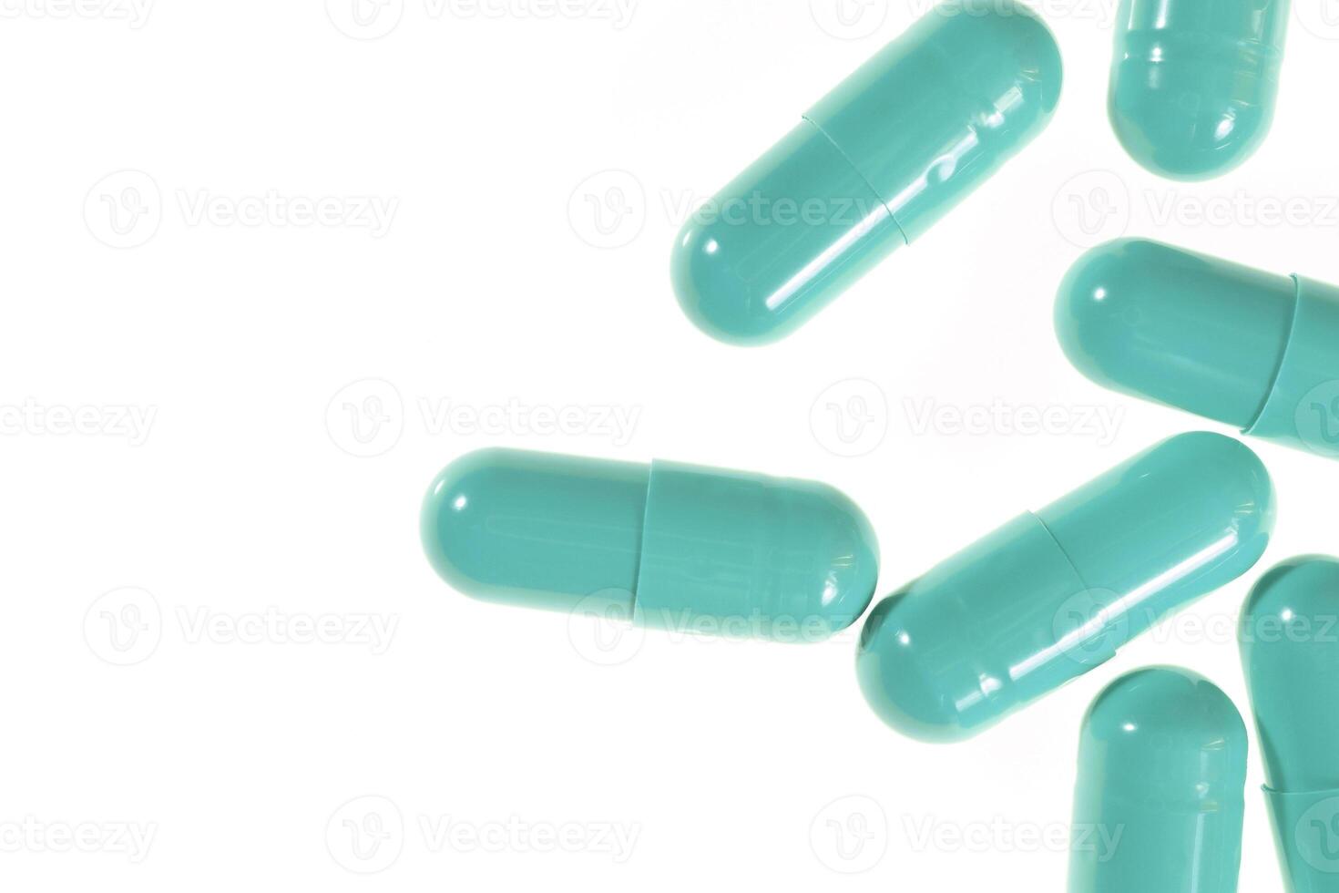 Turquoise Isolated Pills Texture. Medical Tablets Background. Macro Closeup. photo
