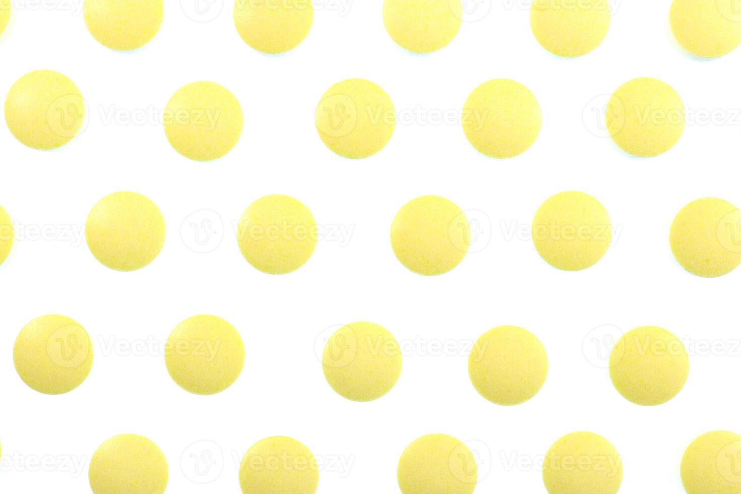 Yellow Isolated Pills Pattern Texture. Medical Background. Macro Closeup. photo