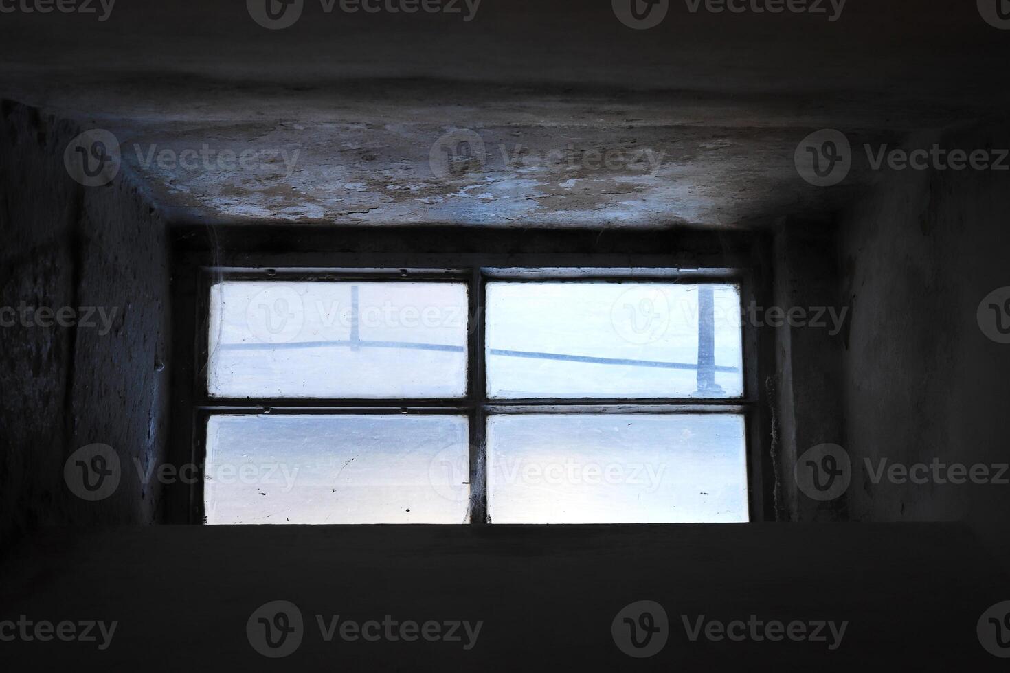 A small window on the way of the staircase to the colonnade of St. Isaac's Cathedral photo