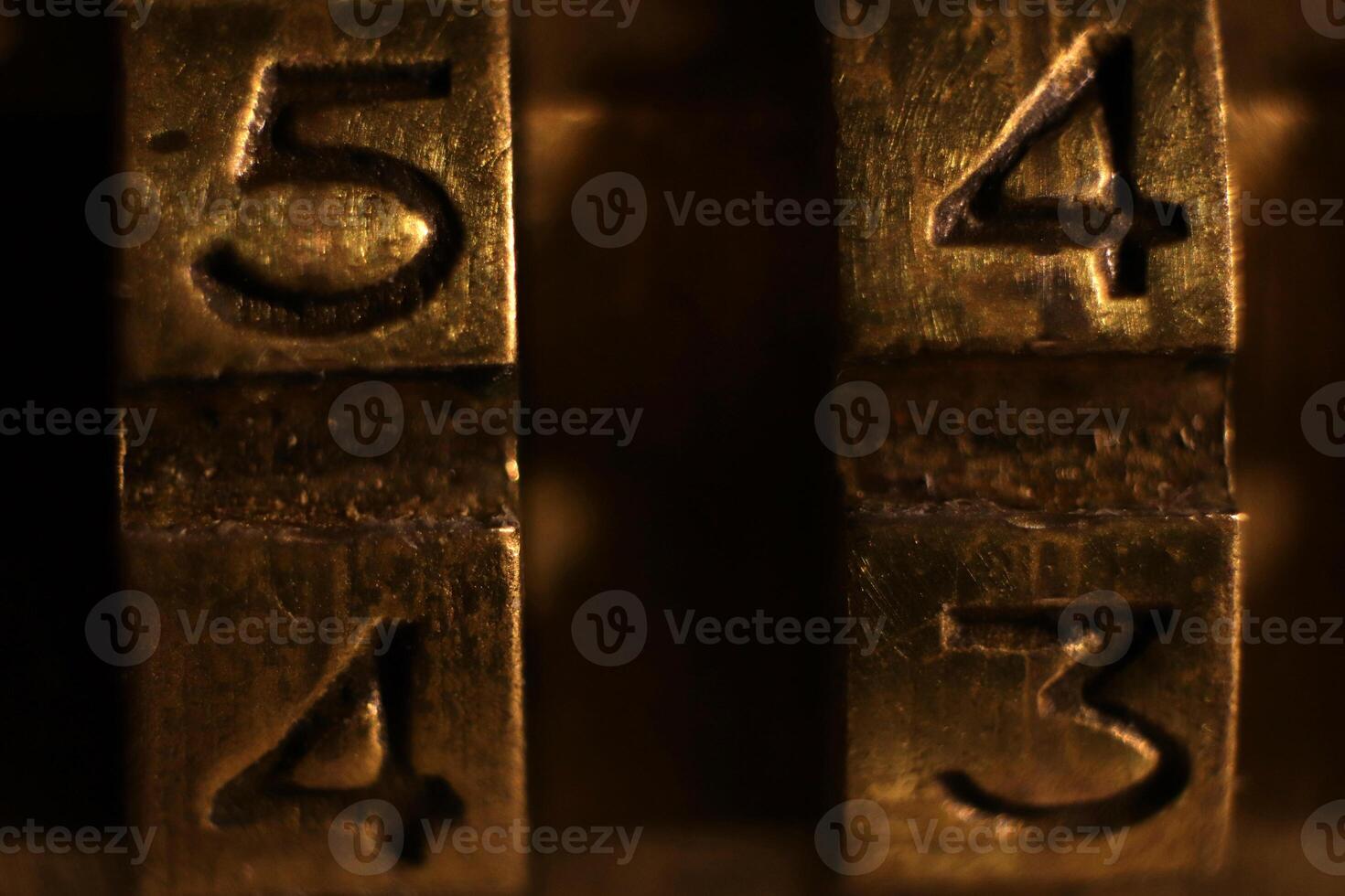 Retro Bronze Lock Numbers 5 4 4 3. photo