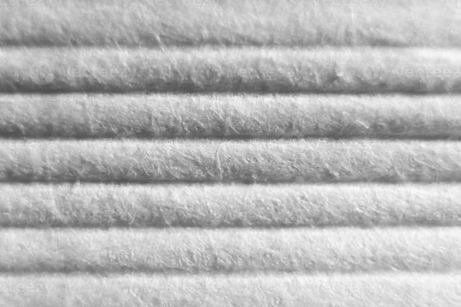 Embossed White Paper Texture. Soft Folds on Detailed Macro Paper Background. photo