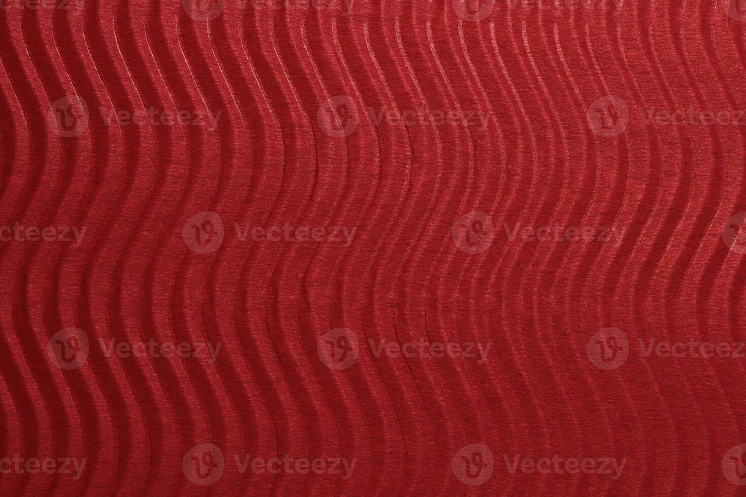 Red Paper Vertical Waves Texture. Embossed Waves on Detailed Paper Background. Corrugated Wavy Cardboard Backdrop. photo