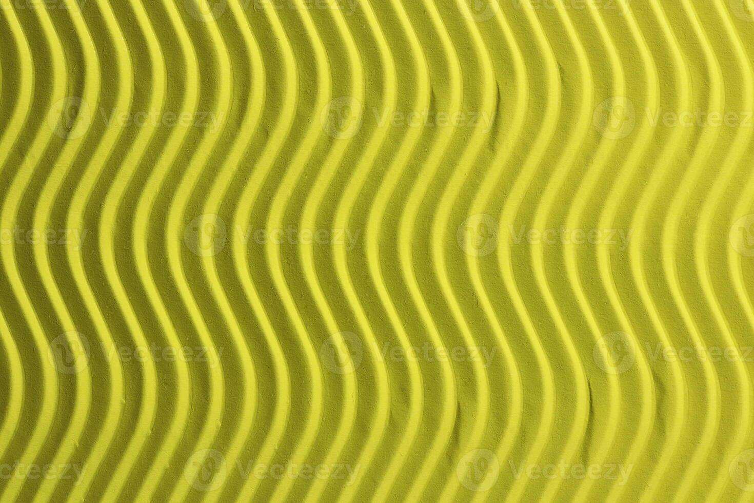 Yellow Paper Vertical Waves Texture. Embossed Waves on Detailed Paper Background. Corrugated Wavy Cardboard Backdrop. photo