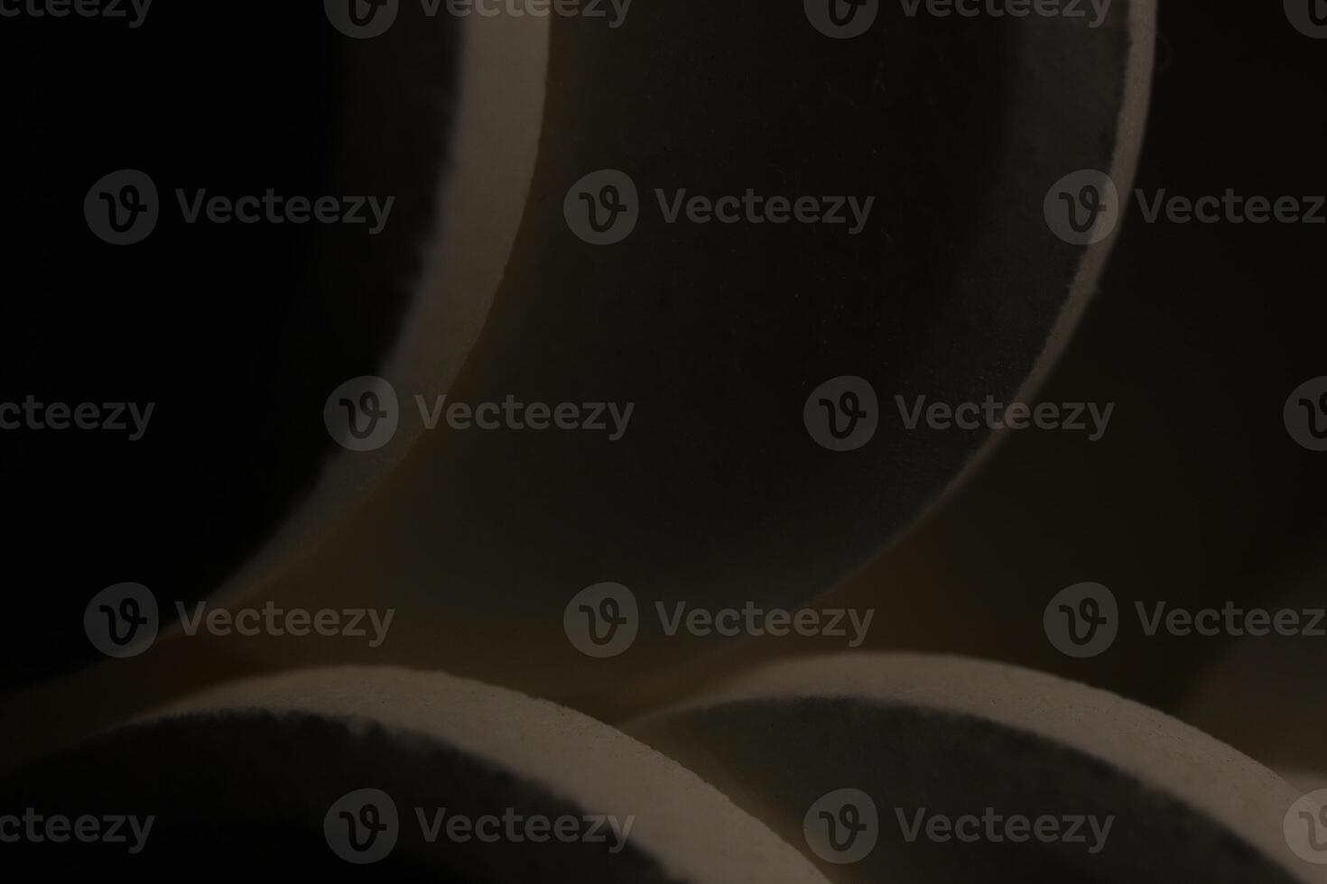 Big Medicine Tablets Stand on Top of Each Other in Dark Background. Macro Closeup. photo