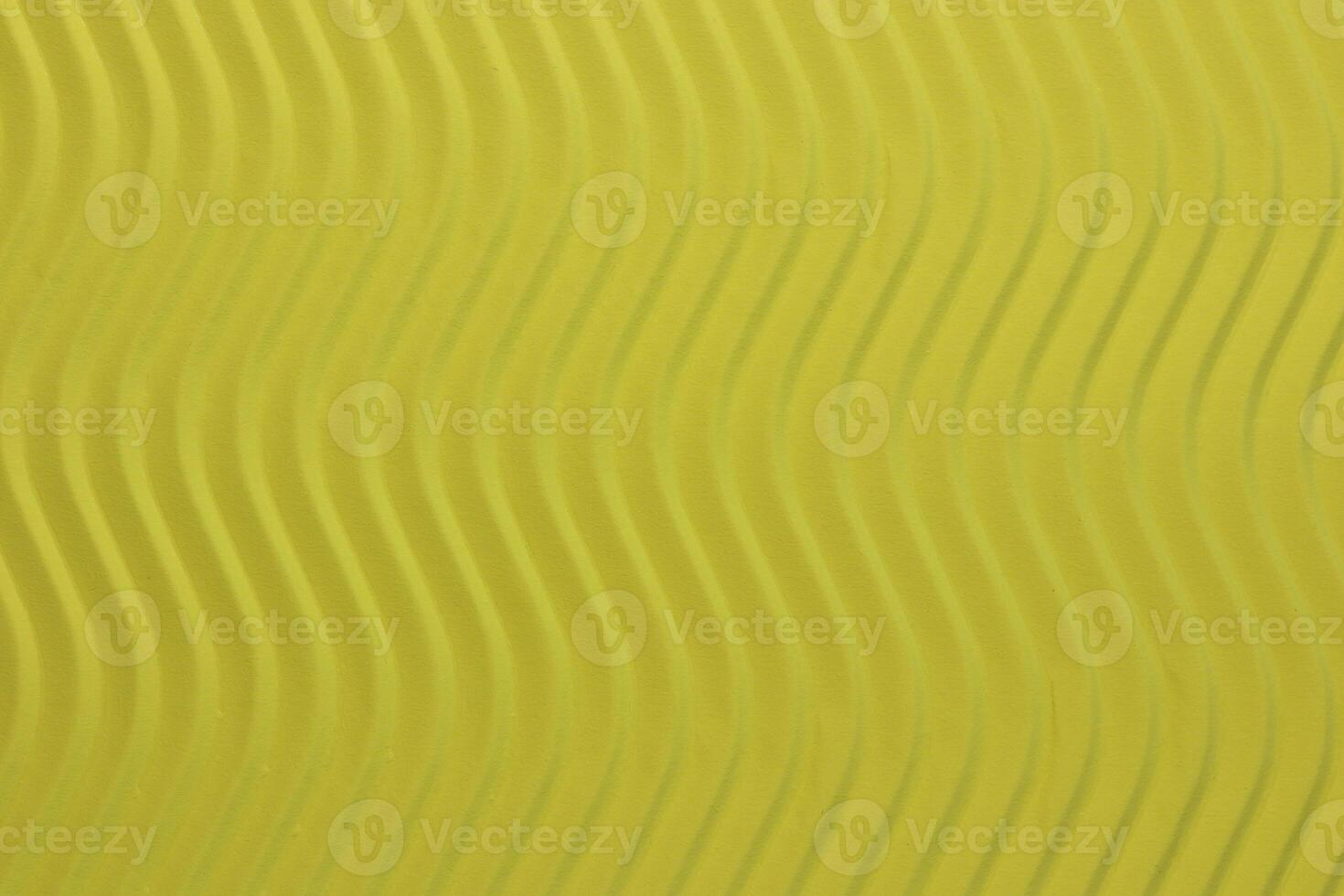 Yellow Paper Waves Texture. Embossed Waves on Detailed Paper Background. Corrugated Wavy Cardboard Backdrop. photo
