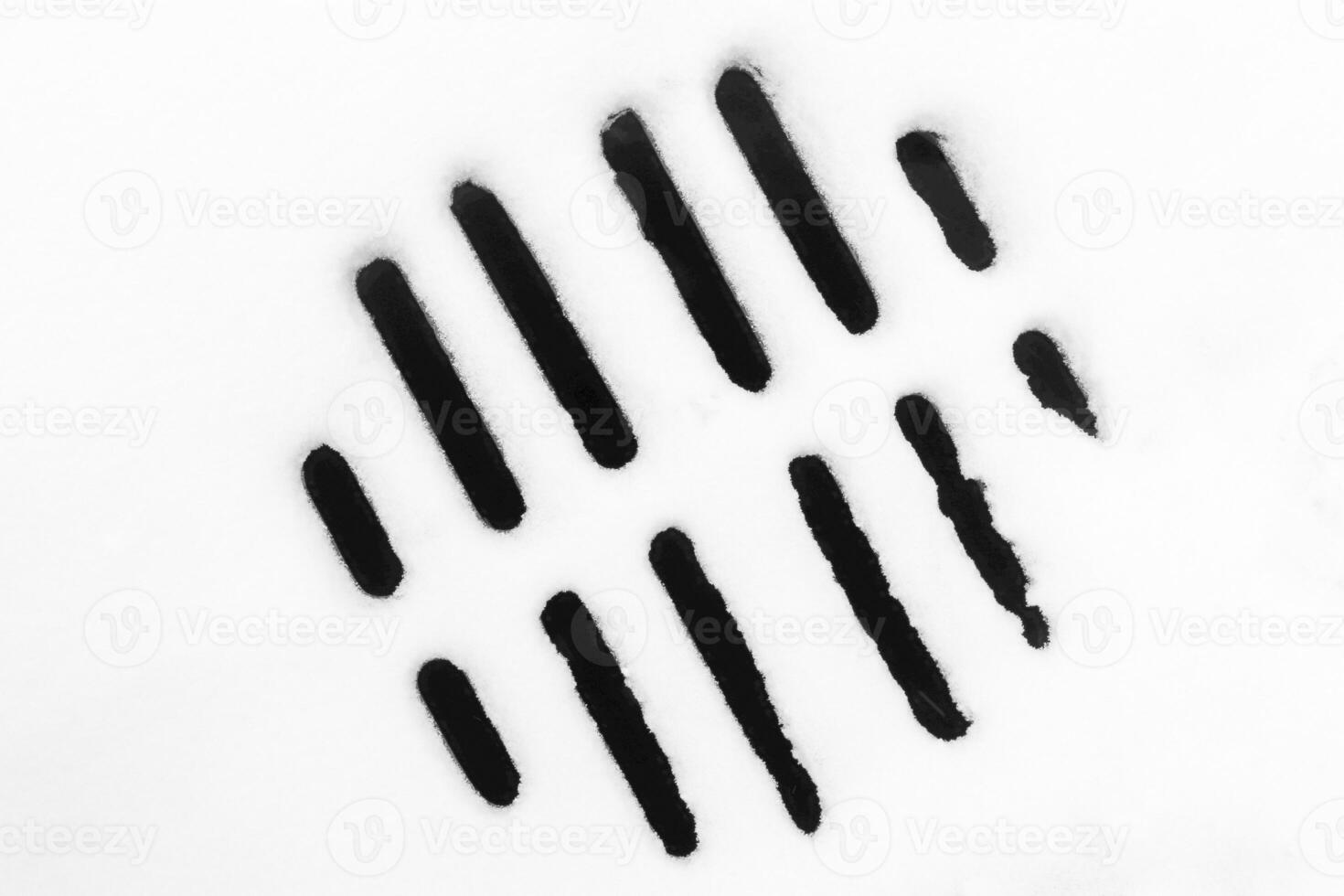 Hatchway holes under snow geometric lines photo