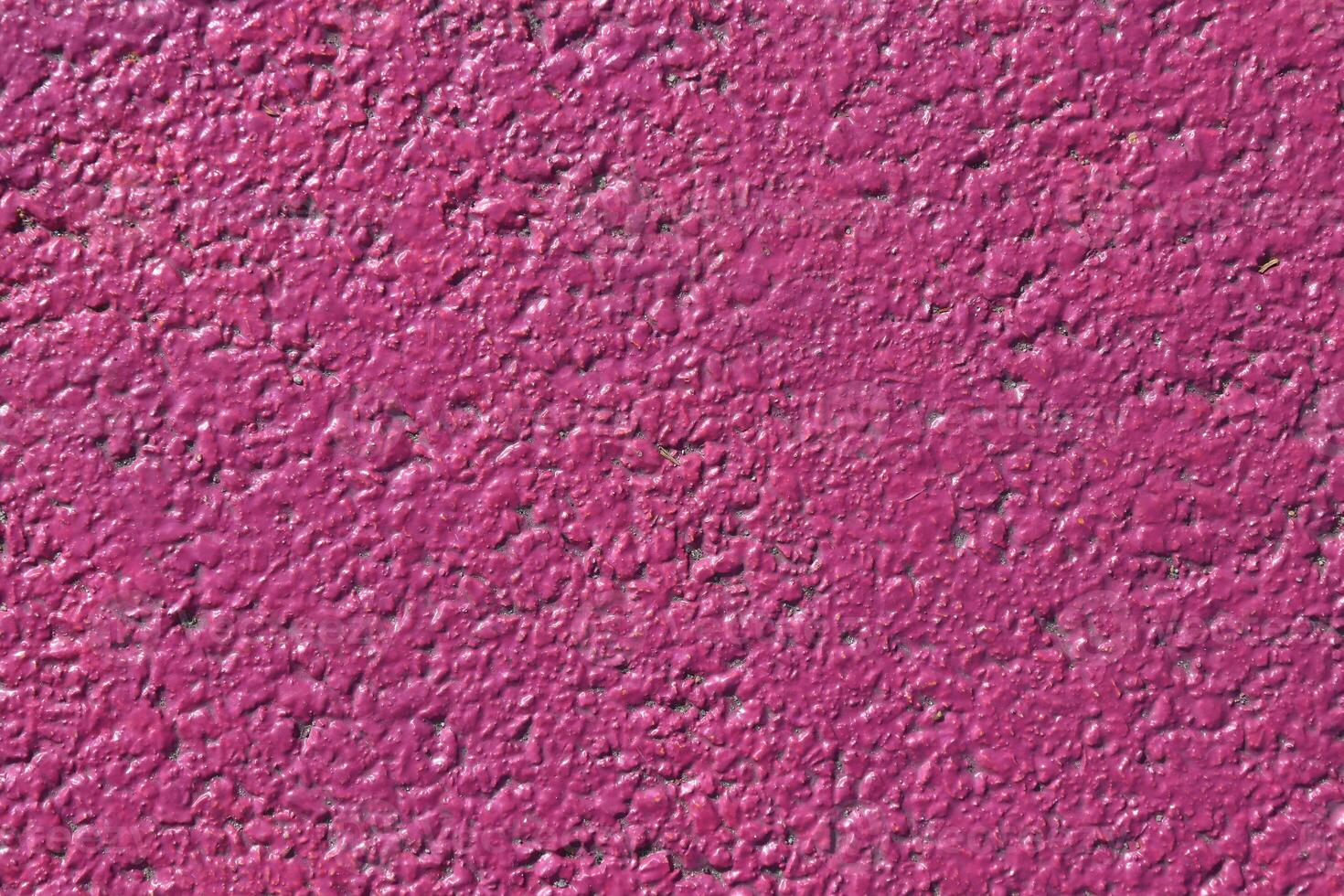 Lilac painted asphalt texture. Colored road surface background. photo