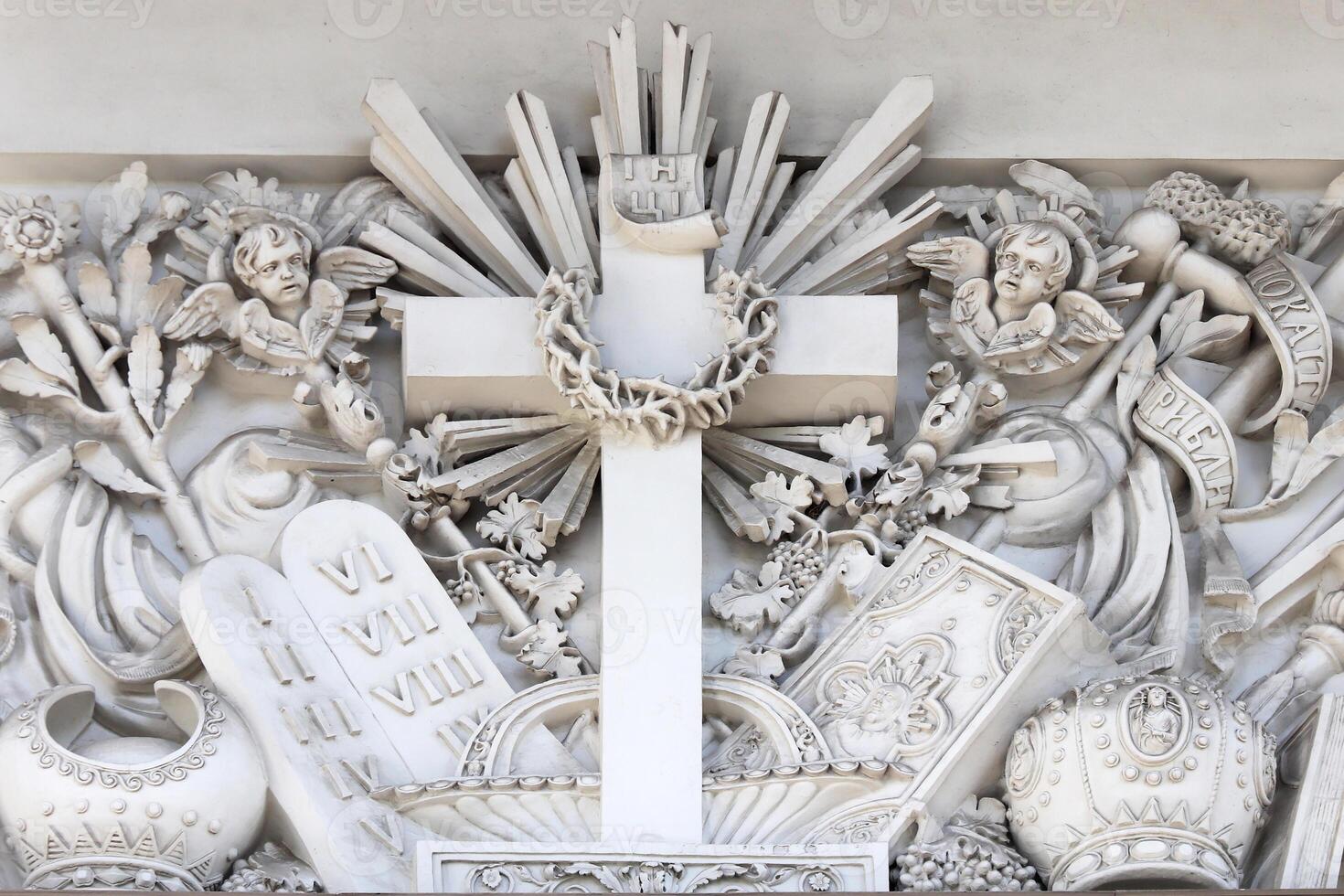 Art stucco on the facade of the main entrance. Trinity Izmailovsky Cathedral. Cathedral of the Holy Life-Giving Trinity of the Life Guards Izmailovsky Regiment. Saint-Petersburg. photo