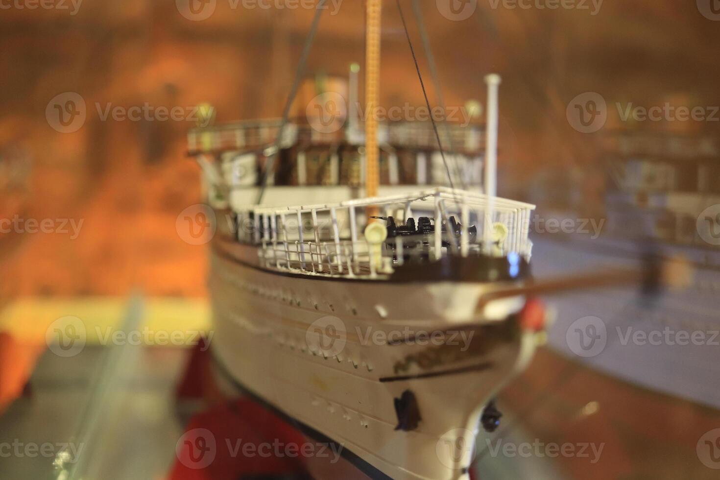 Scaly ship model. White boat layout. Macro closeup. photo