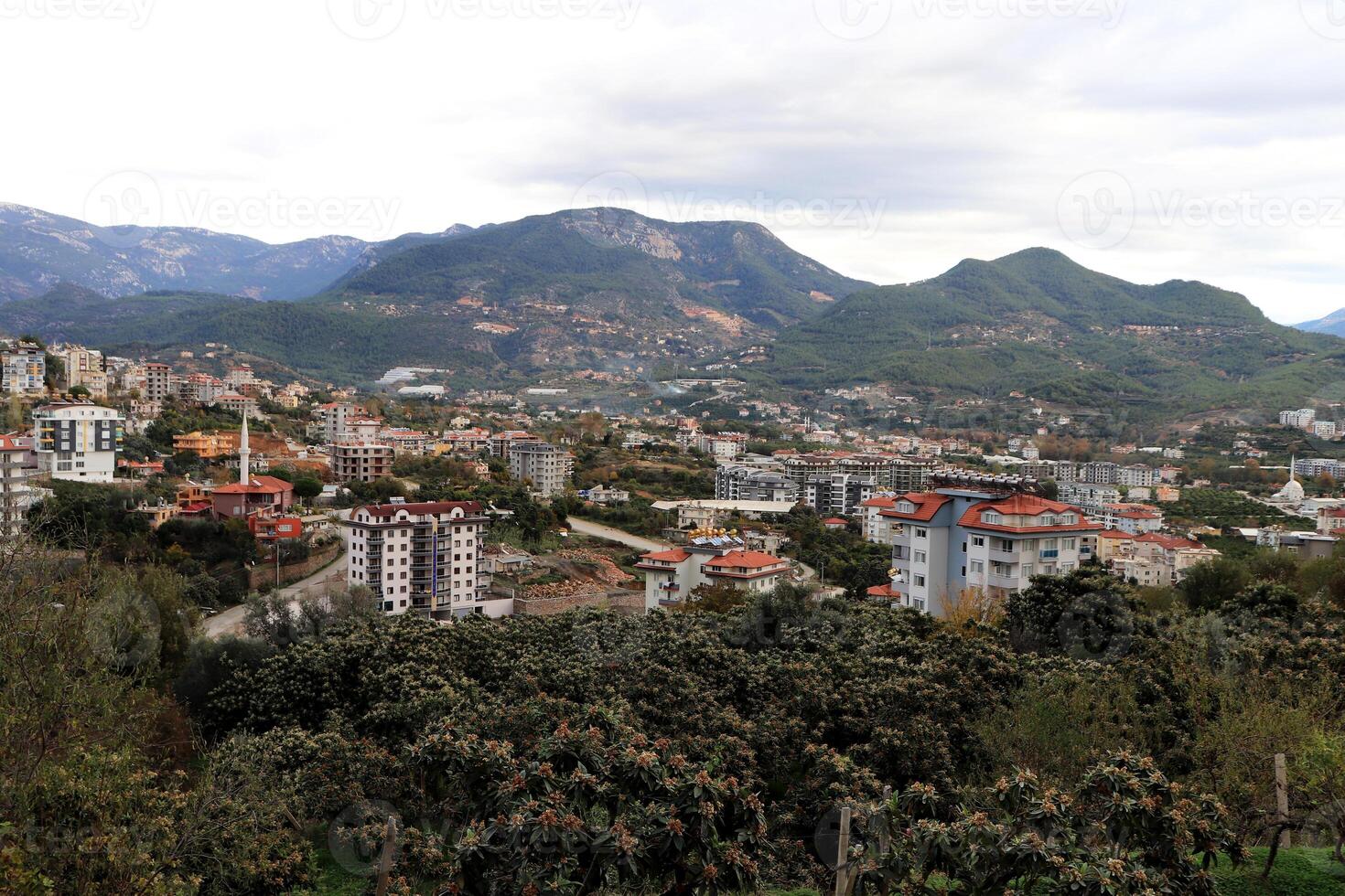 Residential buildings tops in mountains. Alanya. Turkey. photo