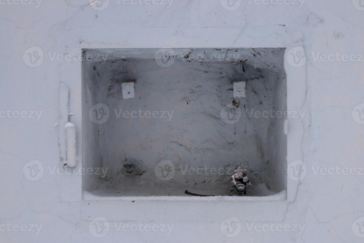 Hole in the building with metal structures photo