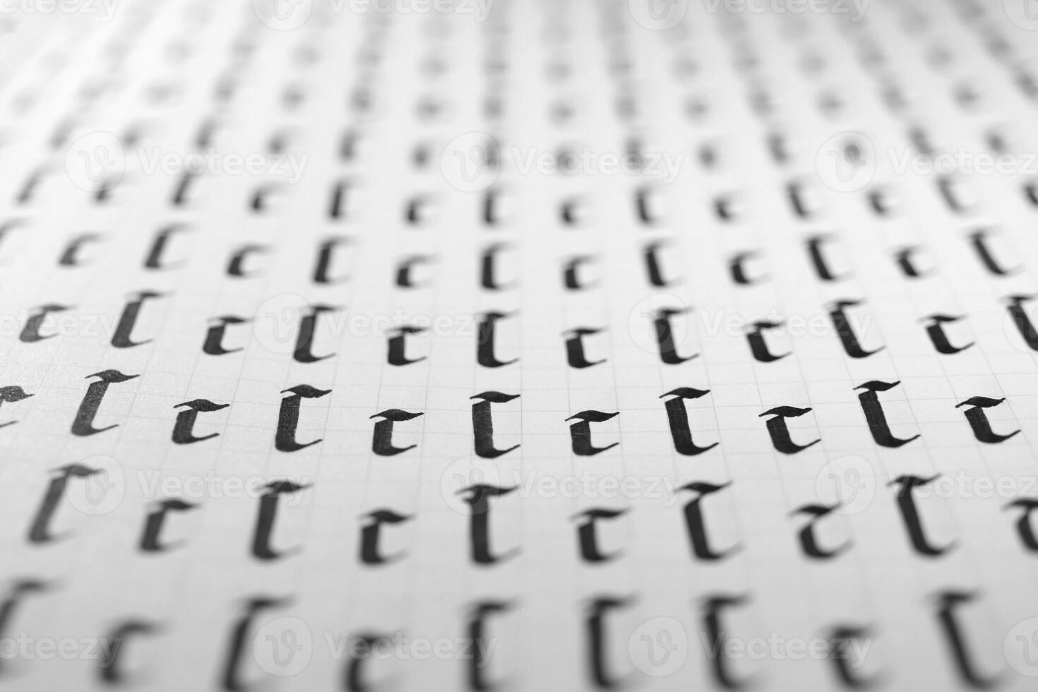 Calligraphy black and white letters C background. Lettering practice writing worksheet. Handwriting symbol filling pattern. Calligraphic letter C learning skills paper page. photo