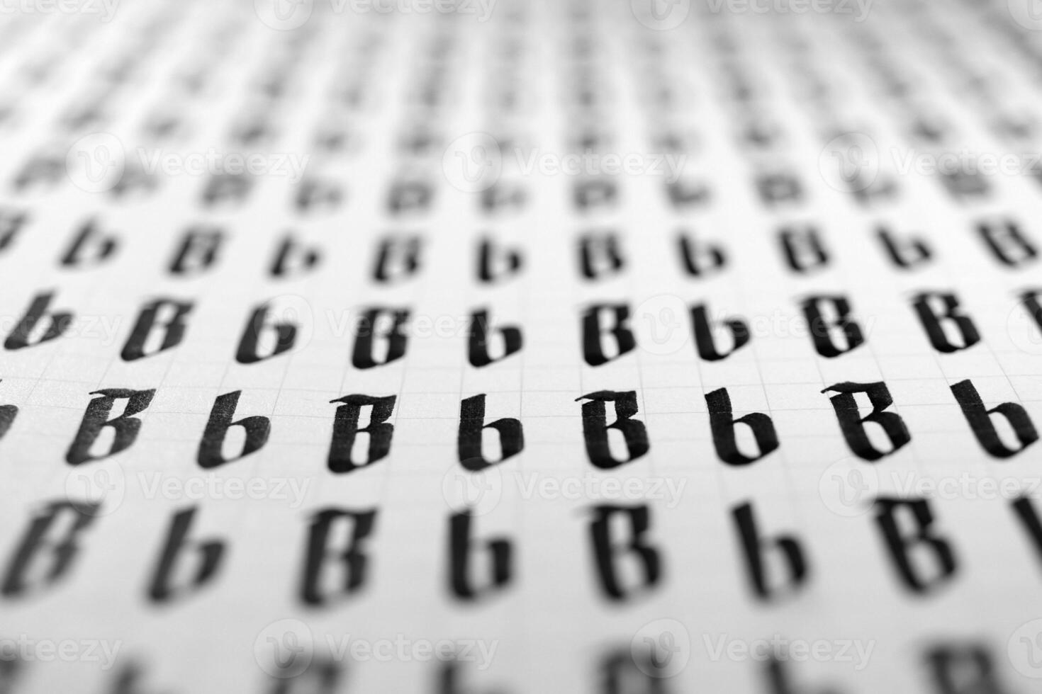 Calligraphy black and white letters B background. Lettering practice writing worksheet. Handwriting symbol filling pattern. Calligraphic letter B learning skills paper page. photo