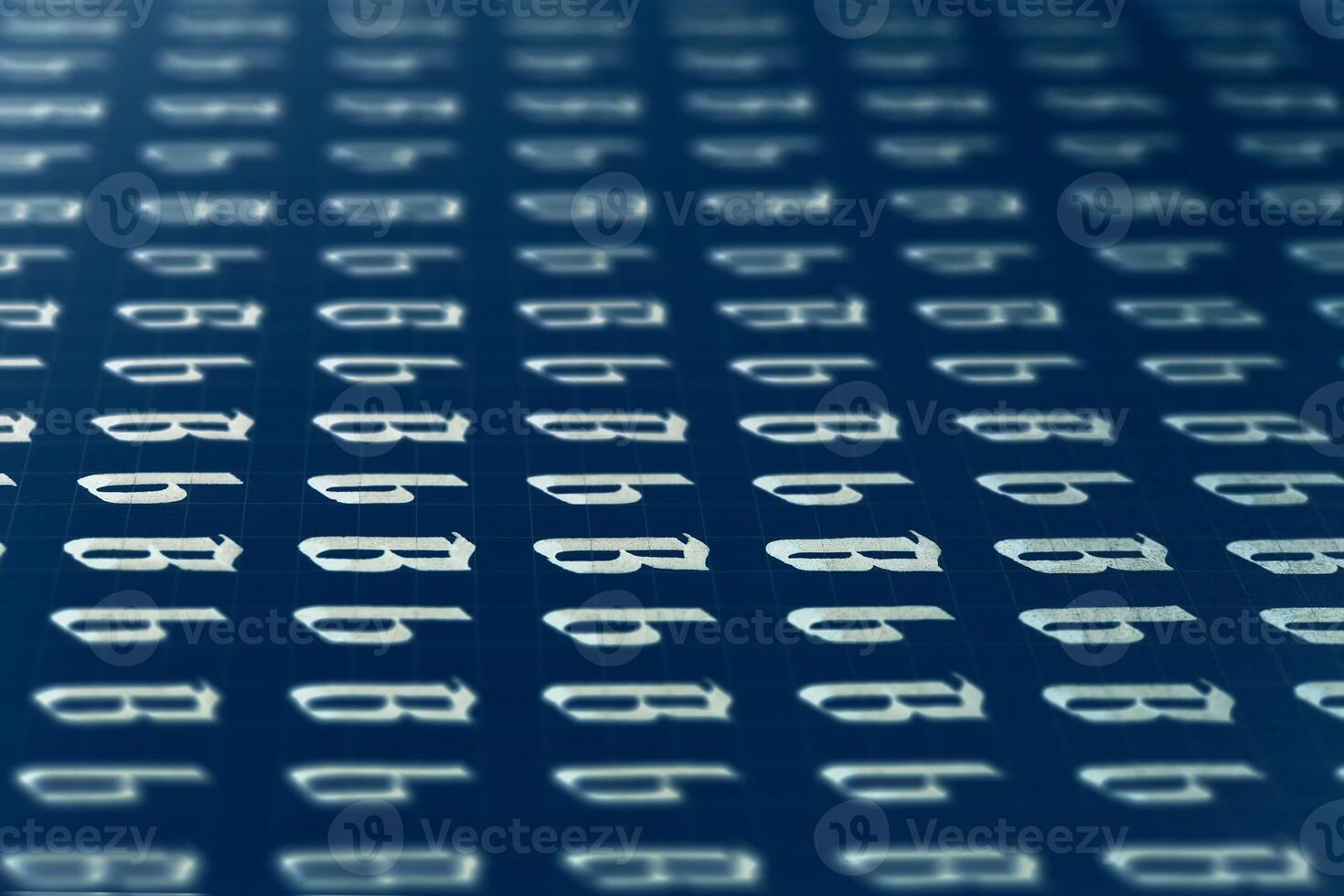 Calligraphic white on dark blue letter B learning skills paper page. Calligraphy letters B background. Lettering practice writing worksheet. Handwriting symbol filling pattern. photo