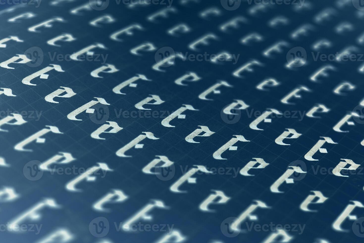 Lettering white on dark blue practice writing worksheet. Handwriting symbol filling pattern. Calligraphic letter E learning skills paper page. Calligraphy letters E background. photo