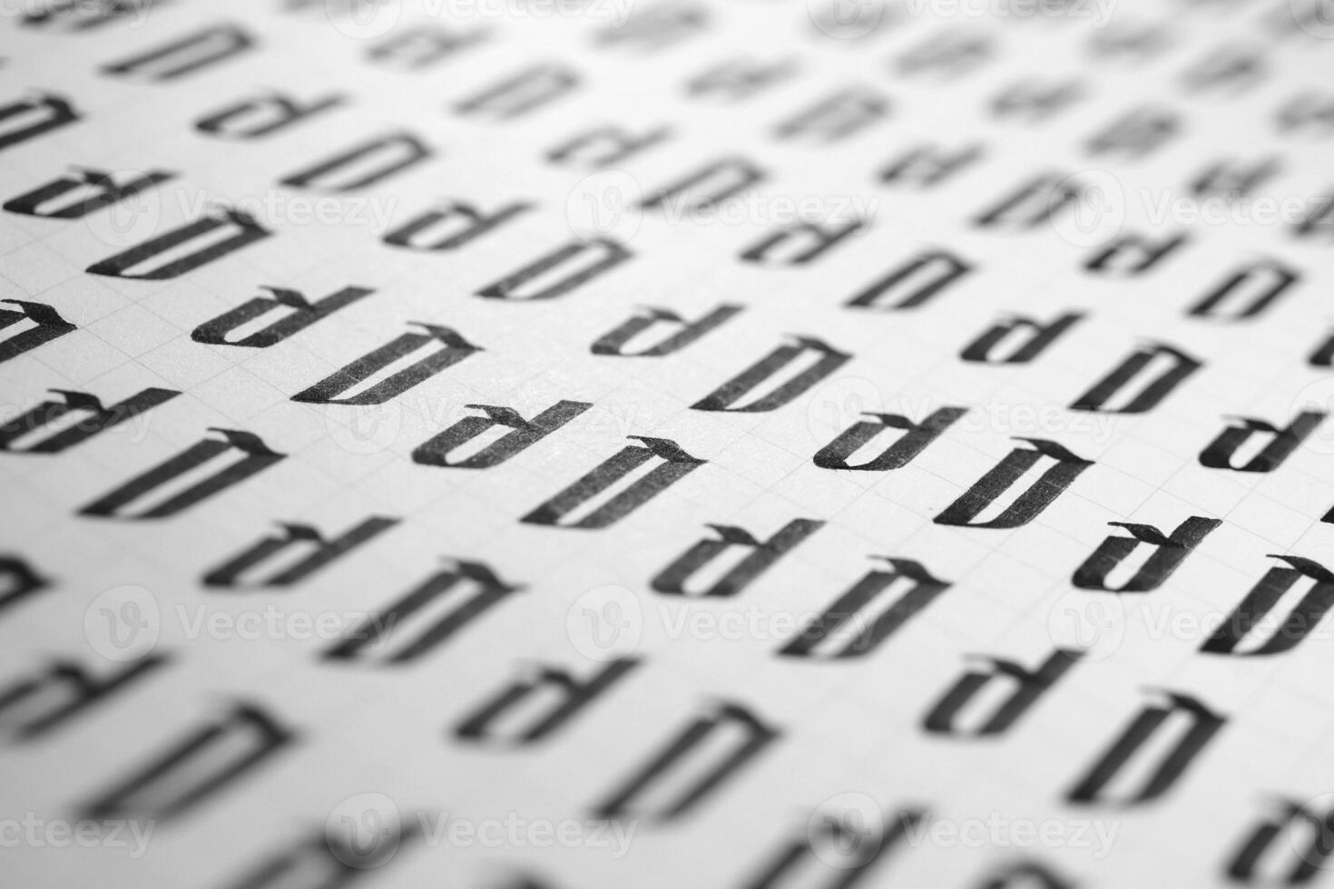 Handwriting black and white symbol filling pattern. Calligraphic letter D learning skills paper page. Calligraphy letters D background. Lettering practice writing worksheet. photo