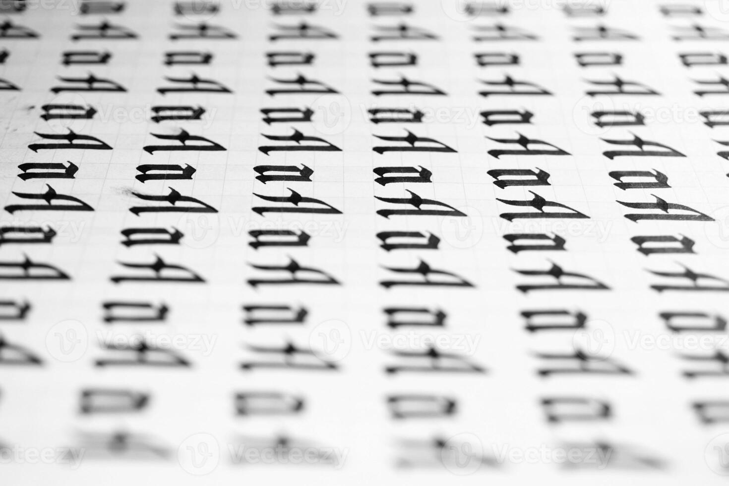 Calligraphy black and white letters A background. Lettering practice writing worksheet. Handwriting symbol filling pattern. Calligraphic letter A learning skills paper page. photo