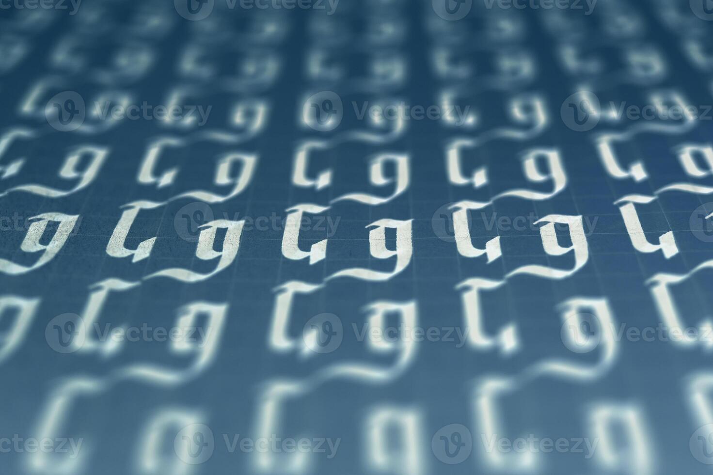 Calligraphic white on dark blue letter G learning skills paper page. Calligraphy letters G background. Lettering practice writing worksheet. Handwriting symbol filling pattern. photo