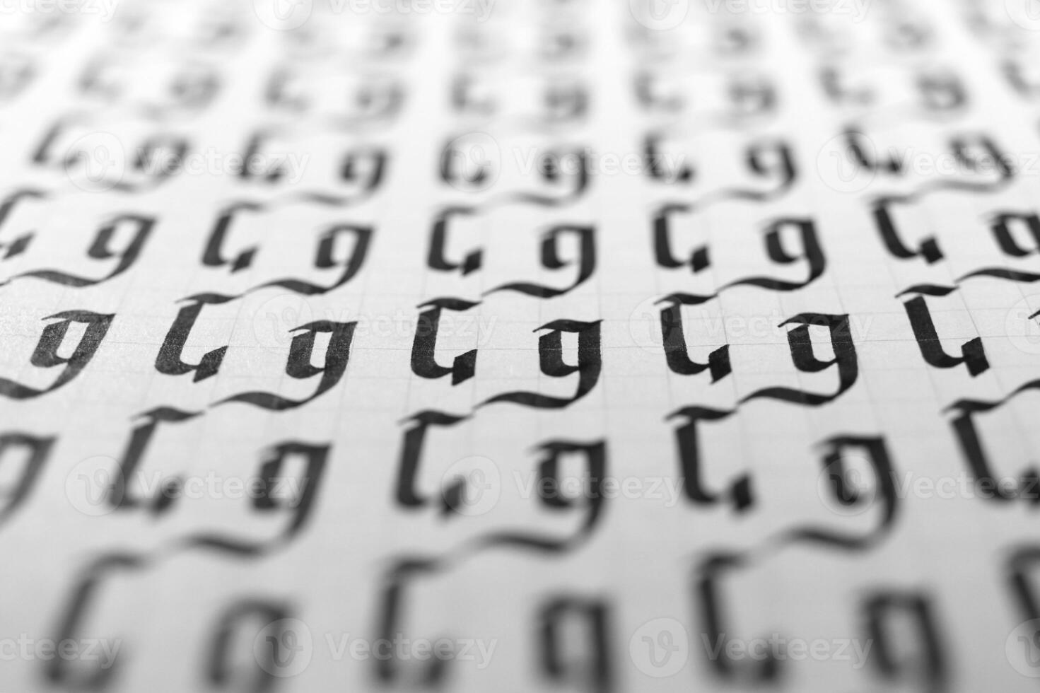 Calligraphy black and white letters G background. Lettering practice writing worksheet. Handwriting symbol filling pattern. Calligraphic letter G learning skills paper page. photo