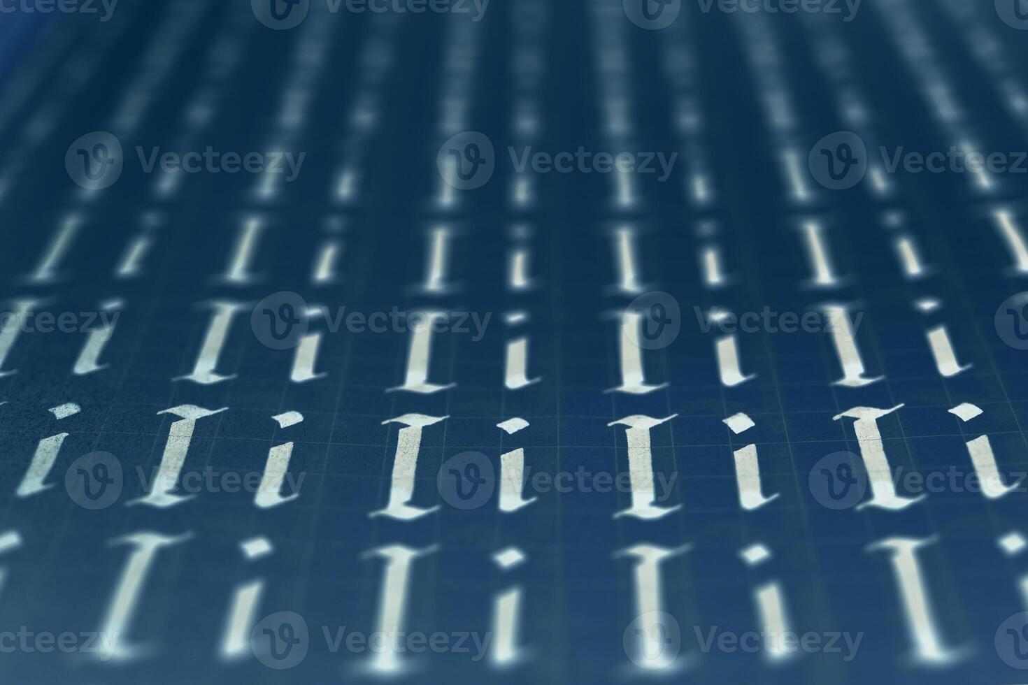 Lettering white on dark blue practice writing worksheet. Handwriting symbol filling pattern. Calligraphic letter I learning skills paper page. Calligraphy letters i background. photo
