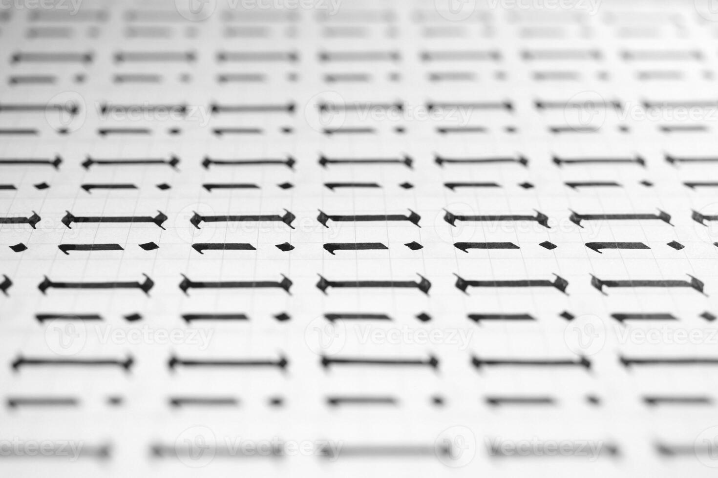 Handwriting black and white symbol filling pattern. Calligraphic letter I learning skills paper page. Calligraphy letters I background. Lettering practice writing worksheet. photo