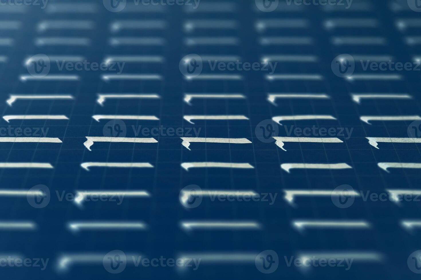 Lettering white on dark blue practice writing worksheet. Handwriting symbol filling pattern. Calligraphic letter L learning skills paper page. Calligraphy letters l background. photo