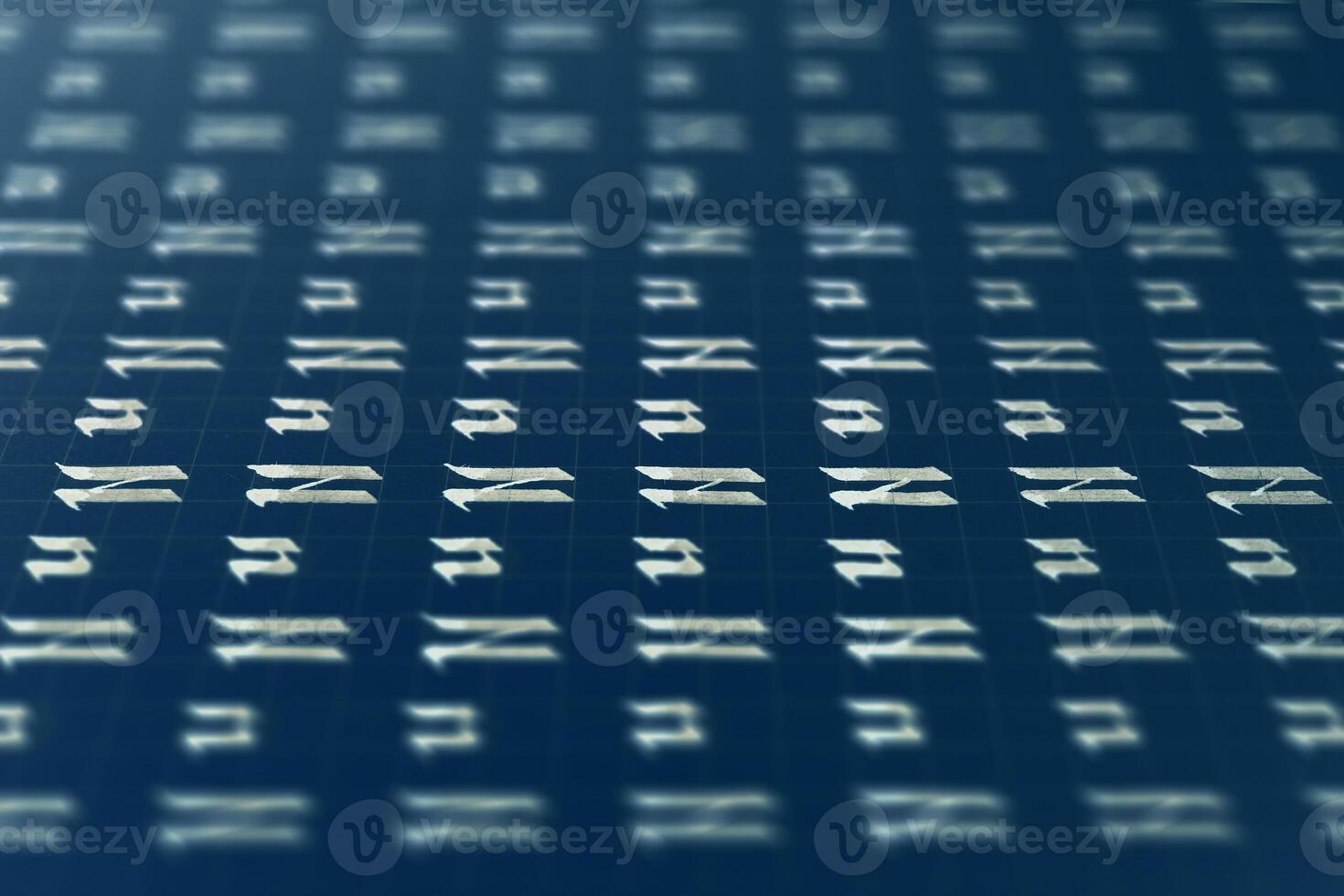 Lettering white on dark blue practice writing worksheet. Handwriting symbol filling pattern. Calligraphic letter N learning skills paper page. Calligraphy letters n background. photo