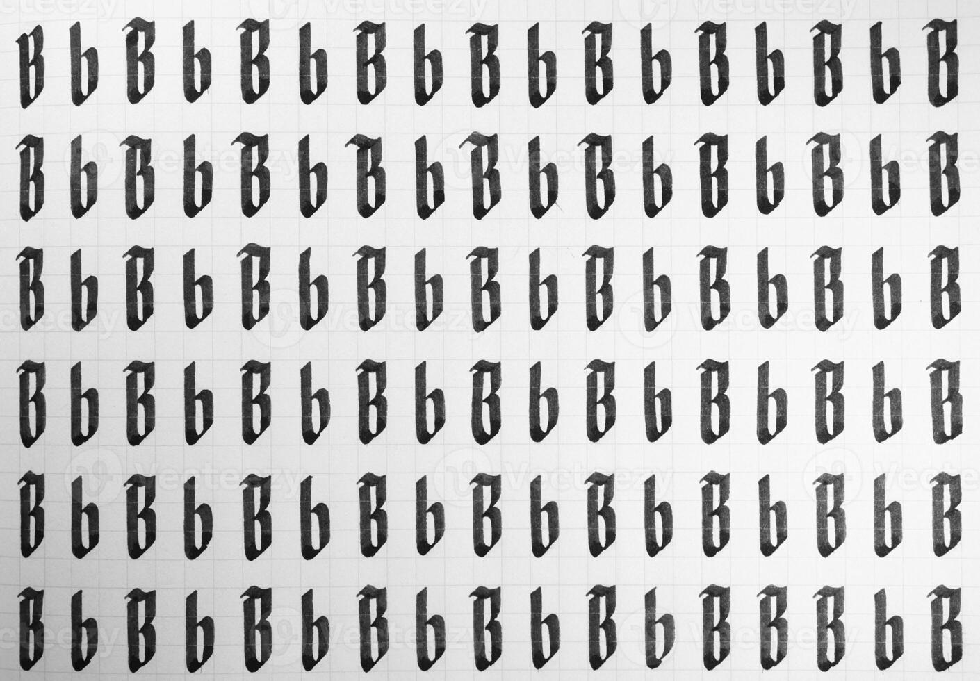 Handwriting black and white symbol filling pattern. Calligraphic letter B learning skills paper page. Calligraphy letters b background. Lettering practice writing worksheet. photo