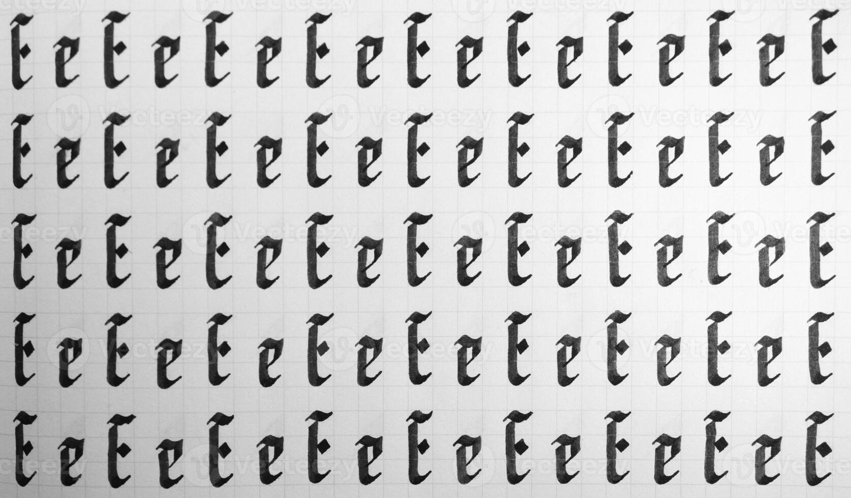 Calligraphy black and white letters E background. Lettering practice writing worksheet. Handwriting symbol filling pattern. Calligraphic letter e learning skills paper page. photo