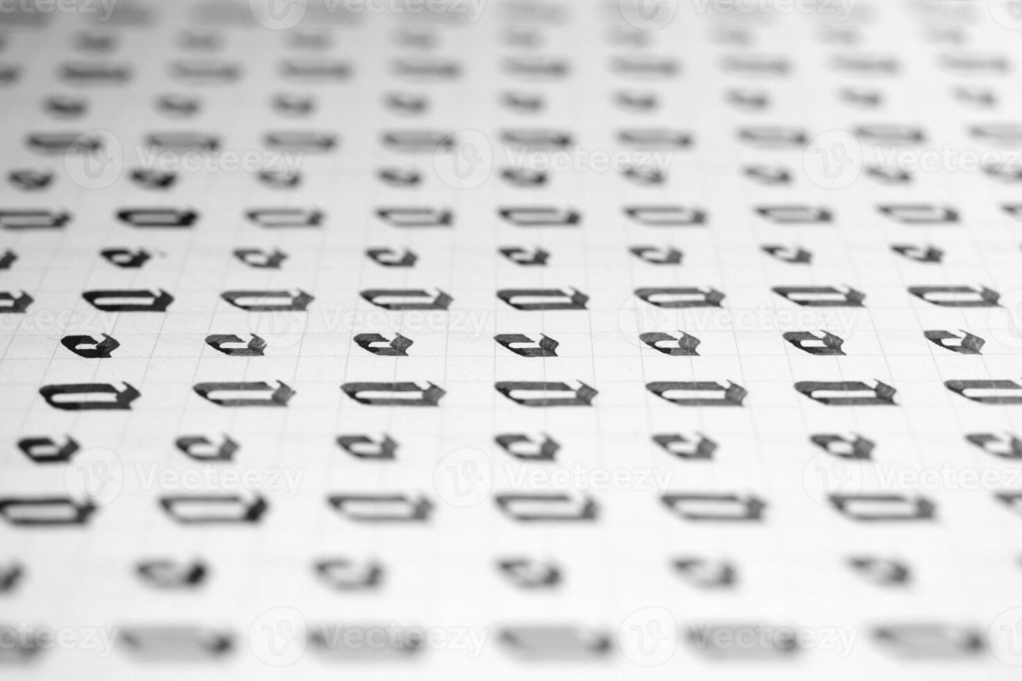 Handwriting black and white symbol filling pattern. Calligraphic letter O learning skills paper page. Calligraphy letters o background. Lettering practice writing worksheet. photo