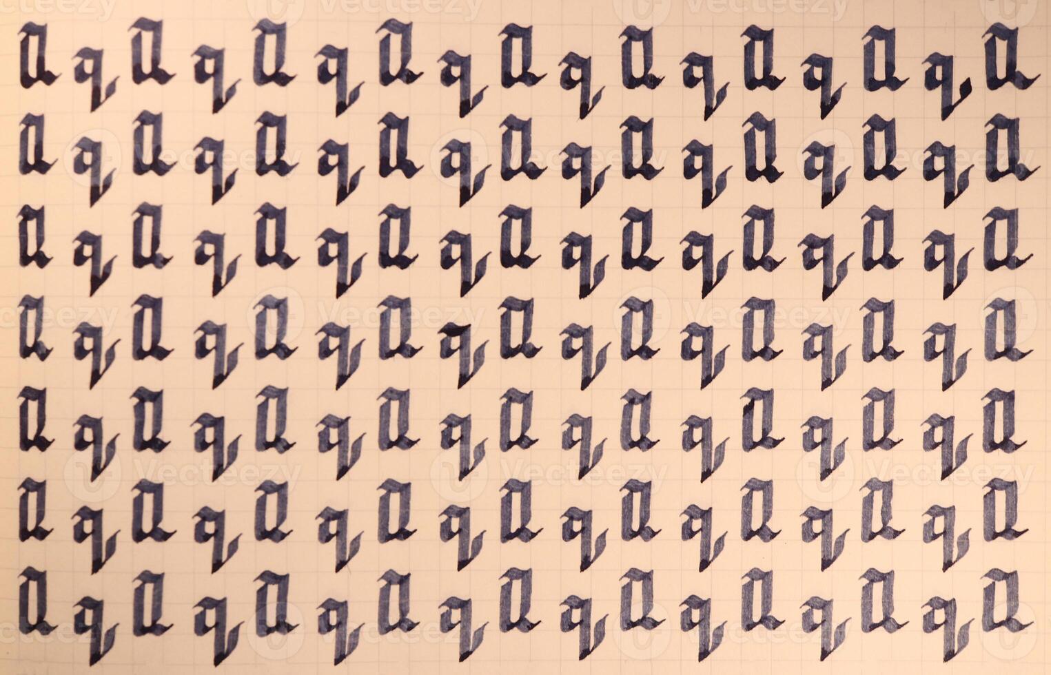 Lettering practice writing worksheet. Handwriting symbol filling pattern. Calligraphic letter Q learning skills paper page. Calligraphy letters q background. photo