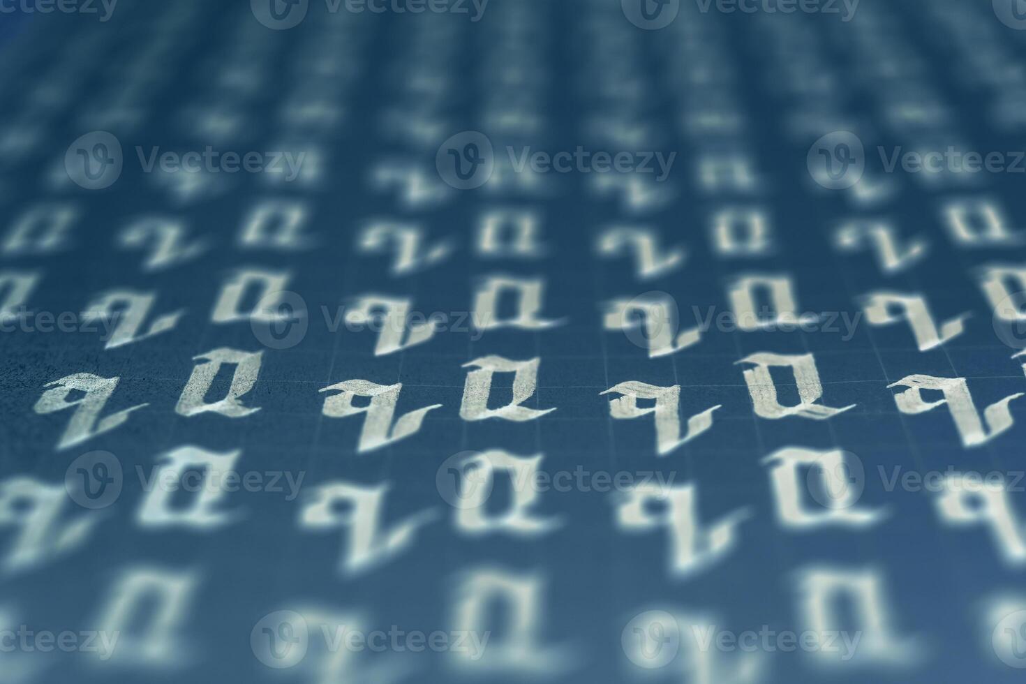 Lettering white on dark blue practice writing worksheet. Handwriting symbol filling pattern. Calligraphic letter Q learning skills paper page. Calligraphy letters q background. photo