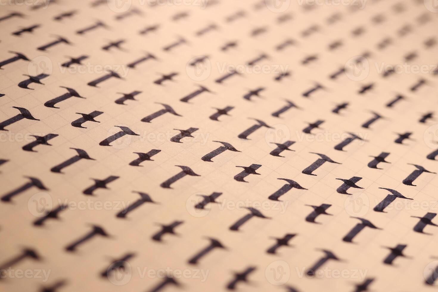 Lettering practice writing worksheet. Handwriting symbol filling pattern. Calligraphic letter T learning skills paper page. Calligraphy letters t background. photo