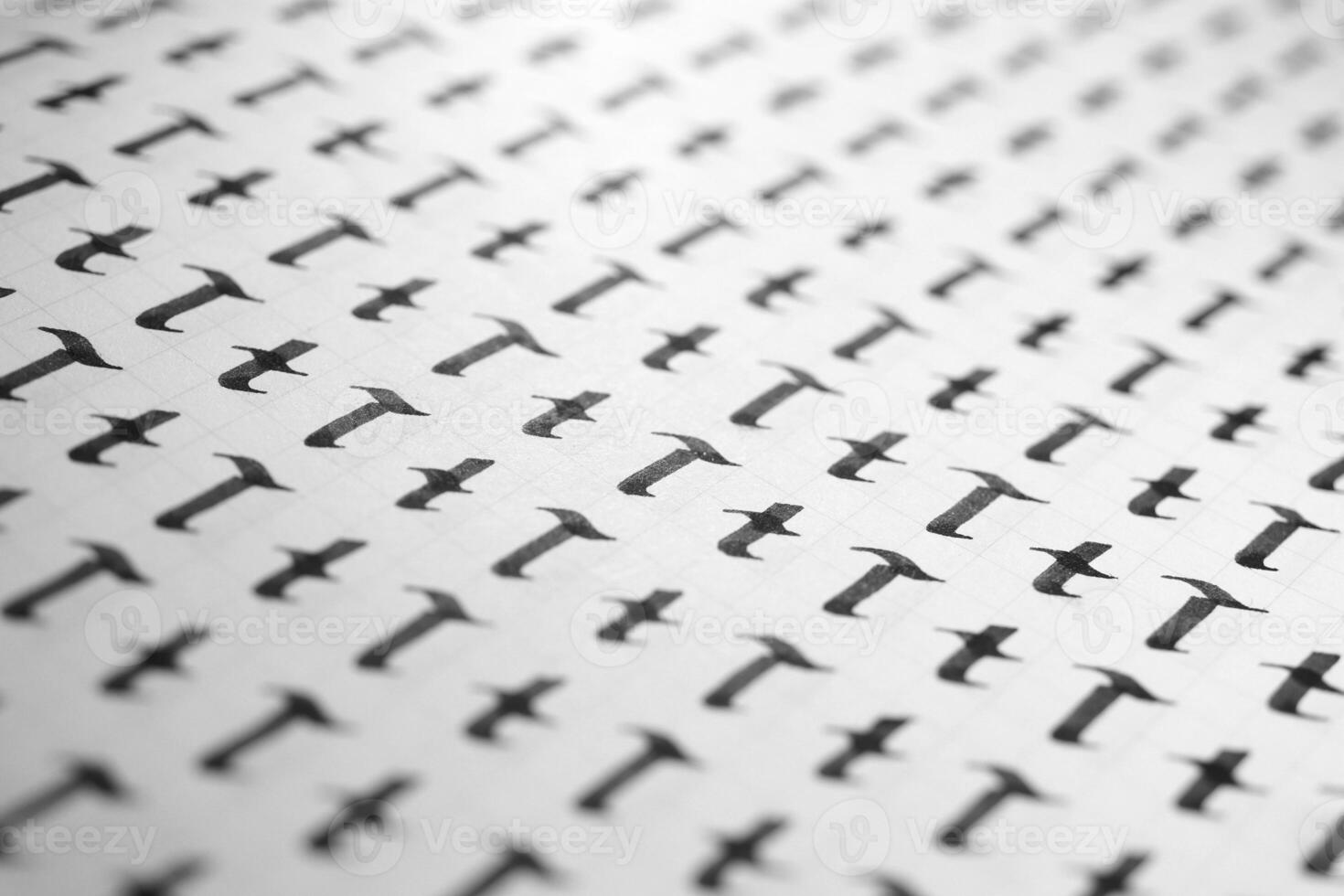 Handwriting black and white symbol filling pattern. Calligraphic letter T learning skills paper page. Calligraphy letters t background. Lettering practice writing worksheet. photo
