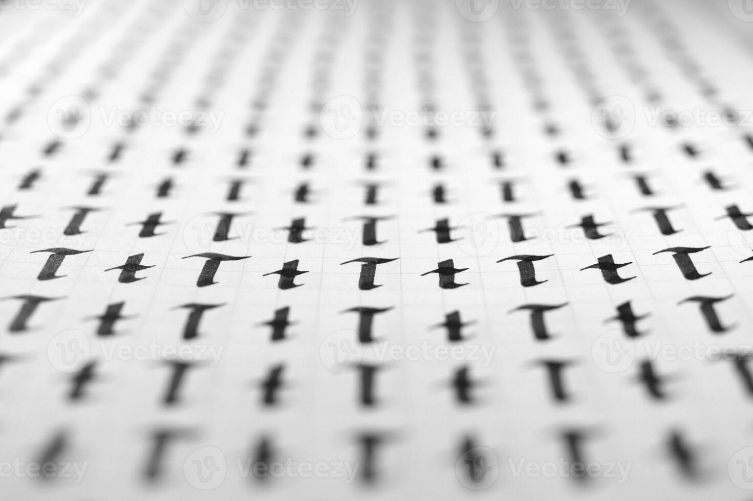 Calligraphy black and white letters T background. Lettering practice writing worksheet. Handwriting symbol filling pattern. Calligraphic letter t learning skills paper page. photo