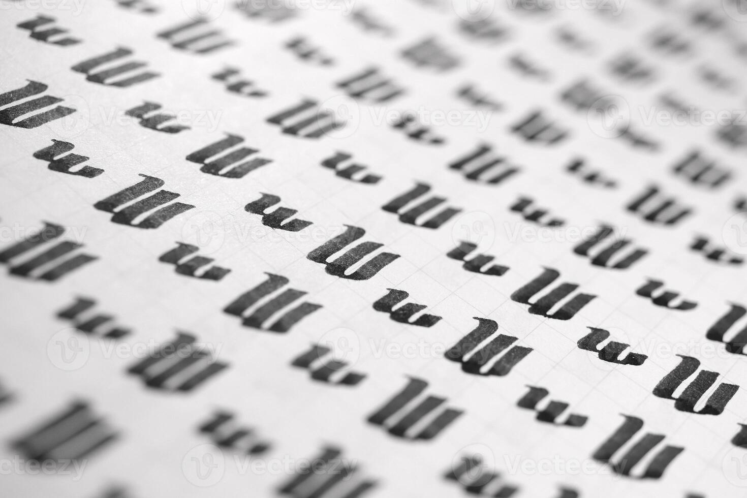 Calligraphy black and white letters W background. Lettering practice writing worksheet. Handwriting symbol filling pattern. Calligraphic letter w learning skills paper page. photo