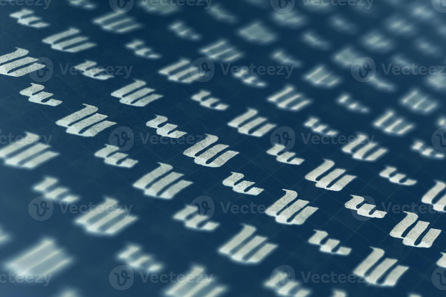 Calligraphic white on dark blue letter W learning skills paper page. Calligraphy letters w background. Lettering practice writing worksheet. Handwriting symbol filling pattern. photo