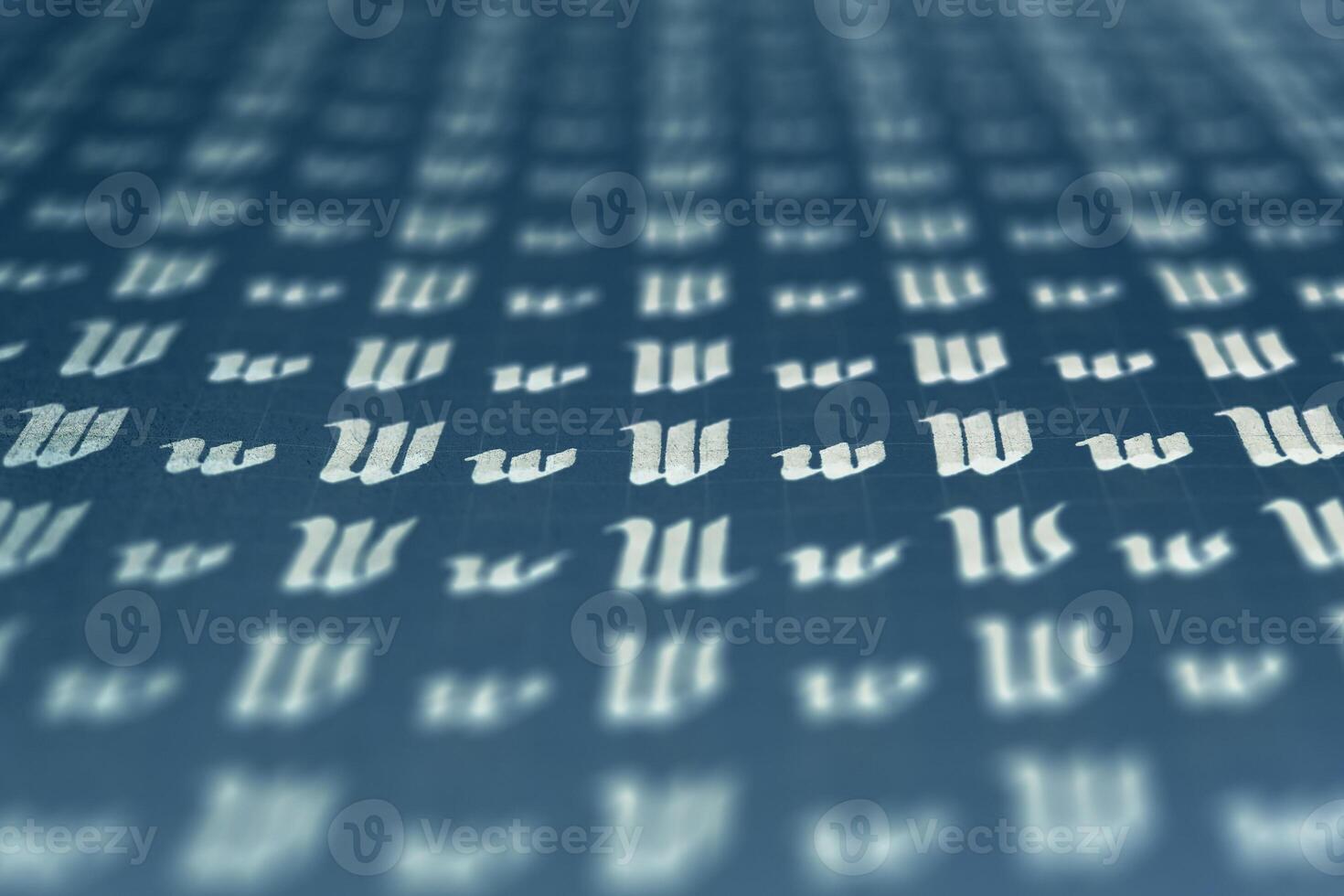 Lettering white on dark blue practice writing worksheet. Handwriting symbol filling pattern. Calligraphic letter W learning skills paper page. Calligraphy letters w background. photo