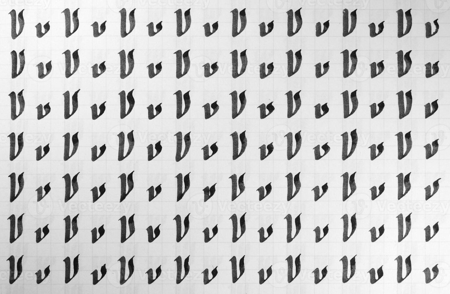 Calligraphy black and white letters V background. Lettering practice writing worksheet. Handwriting symbol filling pattern. Calligraphic letter v learning skills paper page. photo