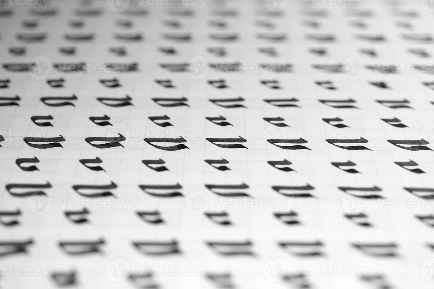 Calligraphy black and white letters V background. Lettering practice writing worksheet. Handwriting symbol filling pattern. Calligraphic letter v learning skills paper page. photo
