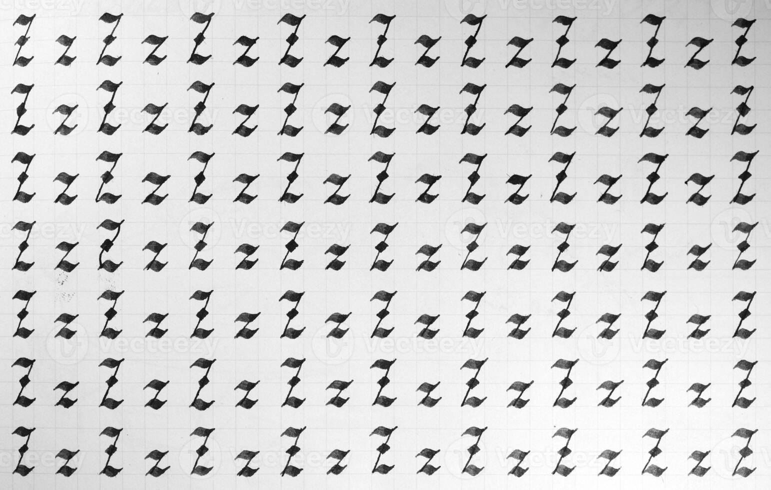 Calligraphy black and white letters Z background. Lettering practice writing worksheet. Handwriting symbol filling pattern. Calligraphic letter z learning skills paper page. photo