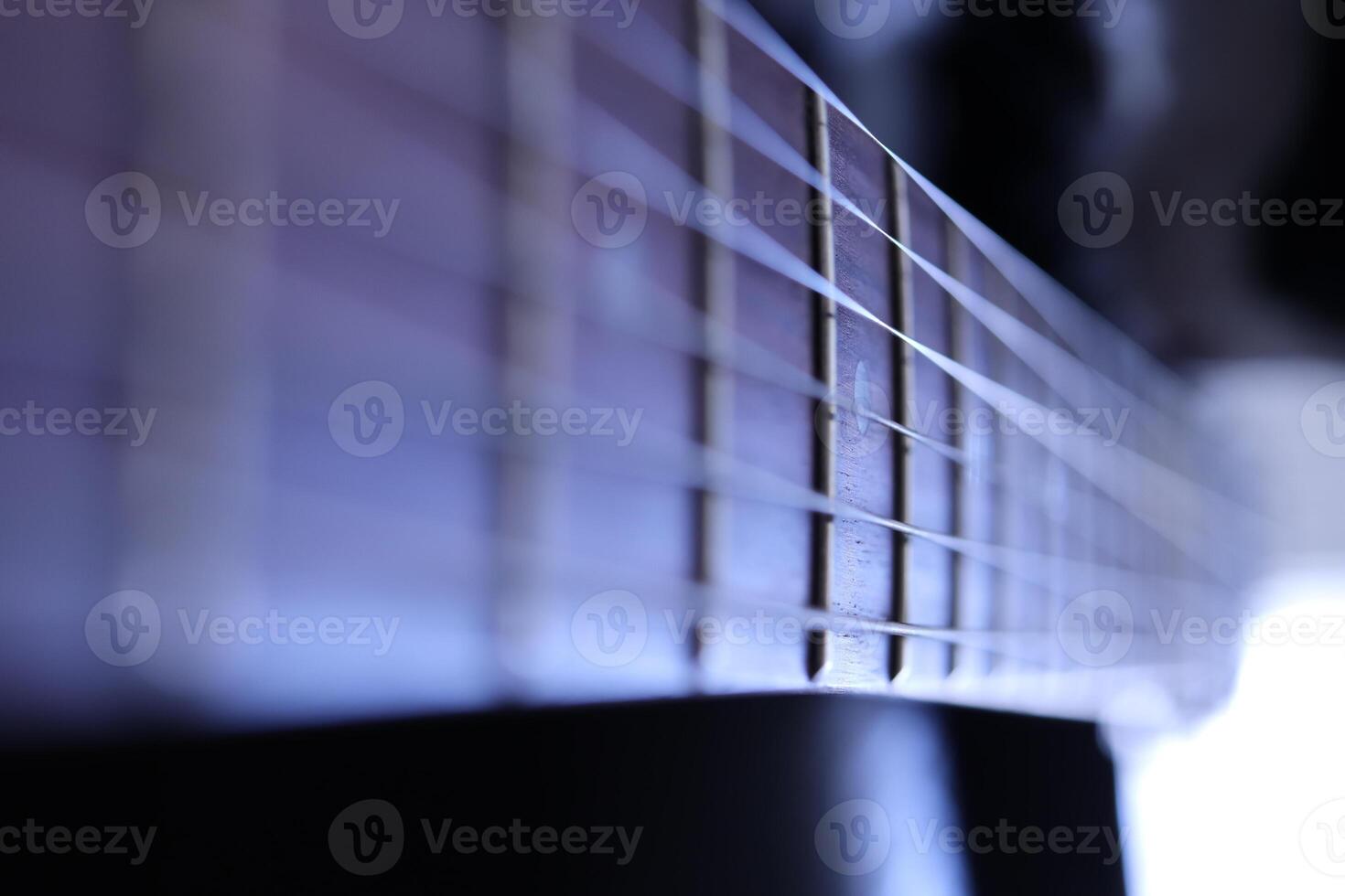 Guitar strings macro closeup. Music instruments background. Musician lifestyle instrument backdrop. photo