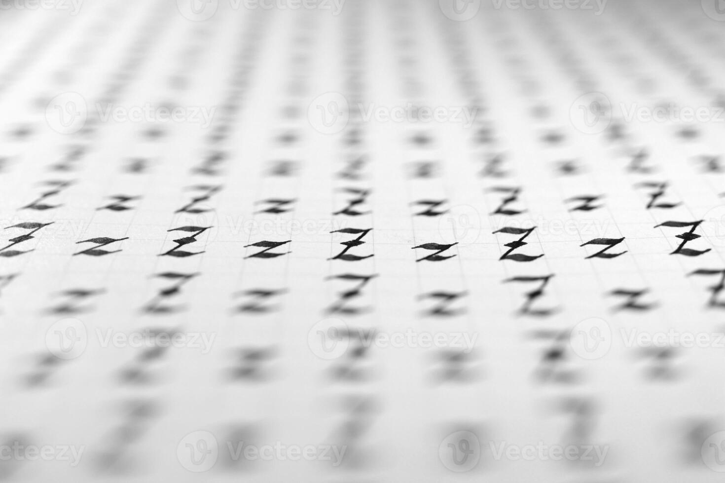 Calligraphy black and white letters Z background. Lettering practice writing worksheet. Handwriting symbol filling pattern. Calligraphic letter z learning skills paper page. photo