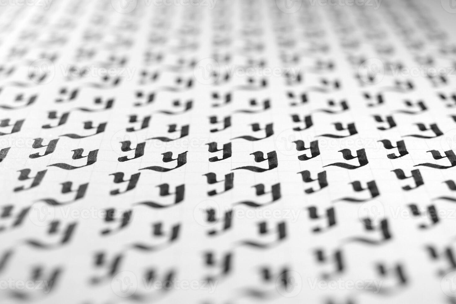 Handwriting black and white symbol filling pattern. Calligraphic letter Y learning skills paper page. Calligraphy letters y background. Lettering practice writing worksheet. photo