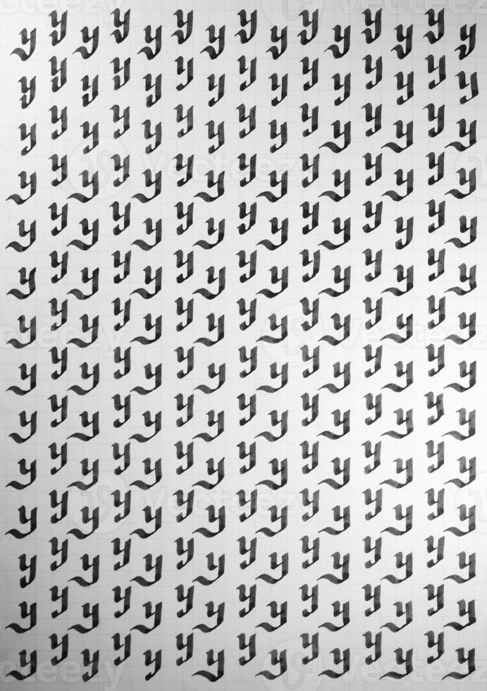 Handwriting black and white symbol filling pattern. Calligraphic letter Y learning skills paper page. photo