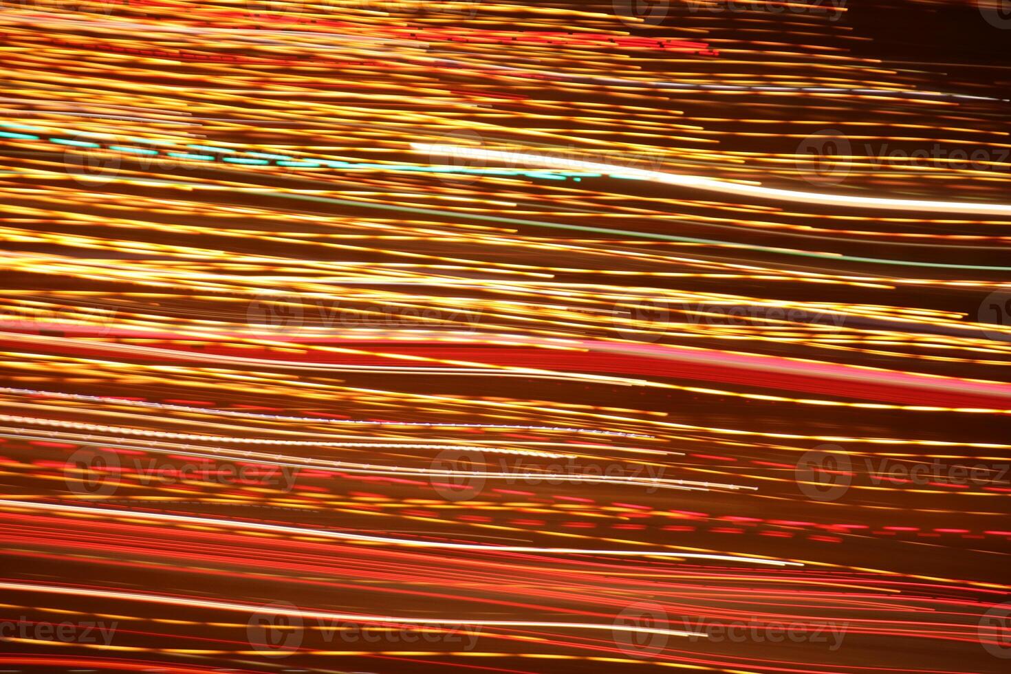 Traffic bright lamps tracks. Road light traces. Trail lines background. photo