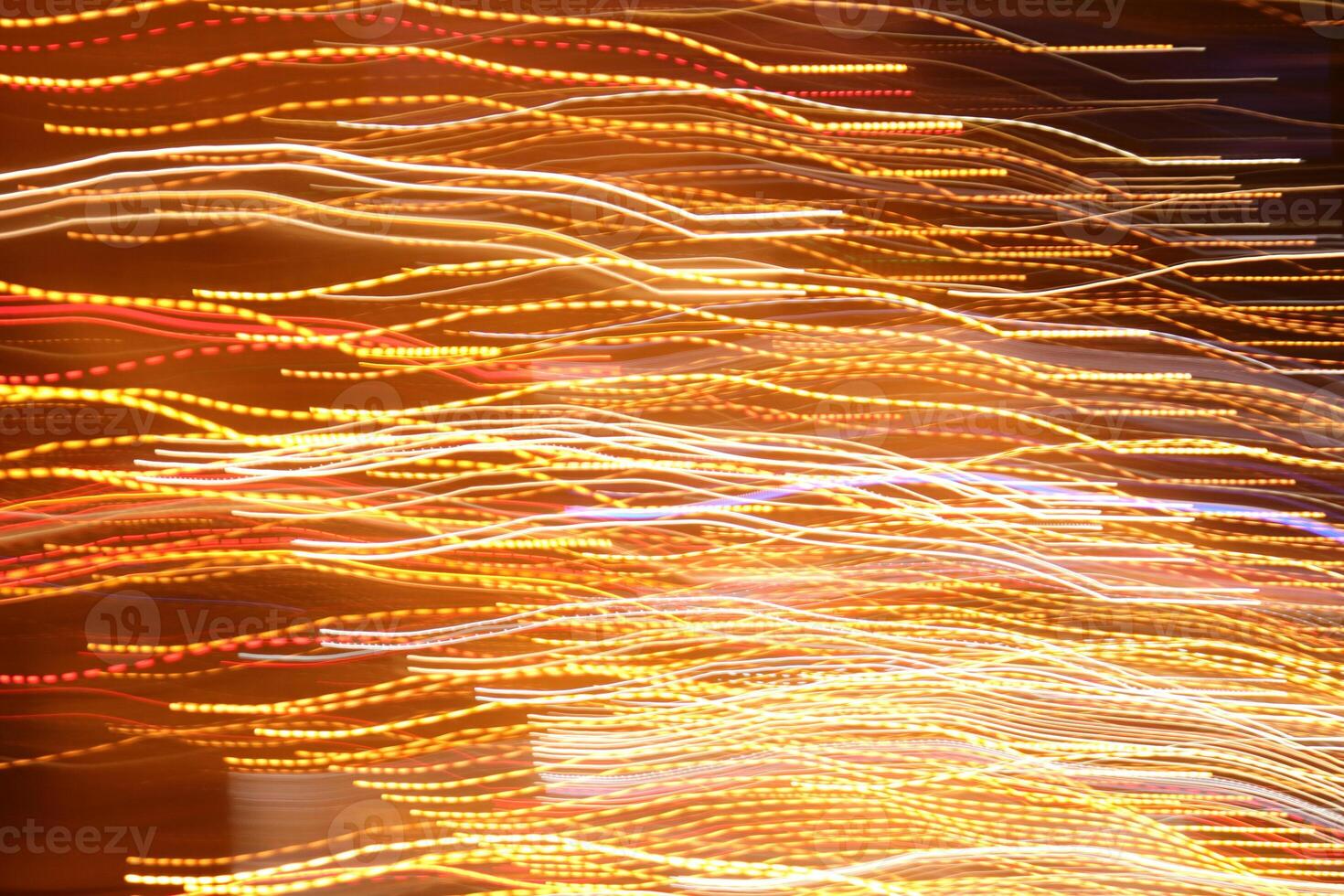 Traffic bright lamps tracks. Road light traces. Trail lines background. photo