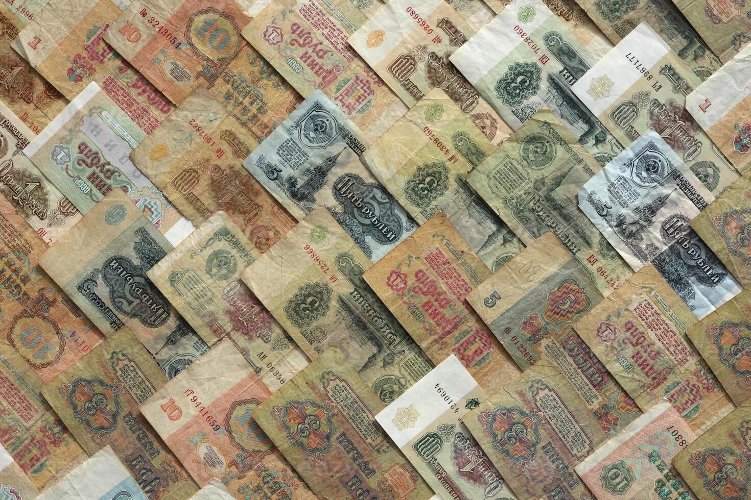 Old Russian wealth financial backdrop. Rubles earning pattern. Soviet money banknotes texture. Cash filling background. photo